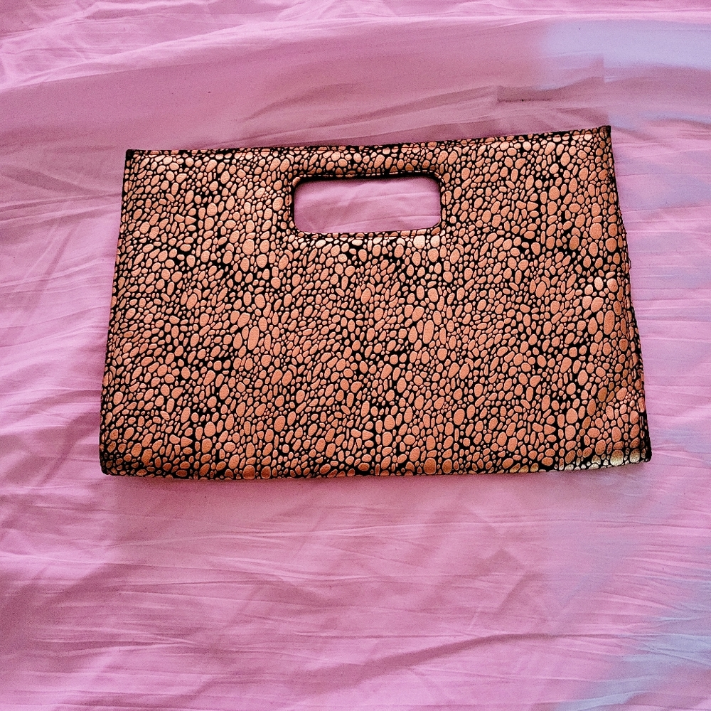 Gold and black clutch